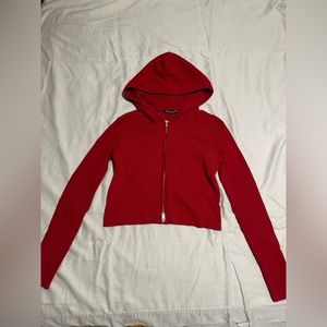 cropped, red zip up jacket